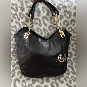 Michael Kor’s soft leather purse